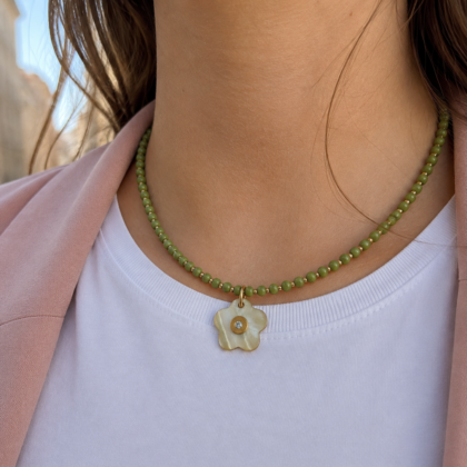 Green necklace with flower pendant