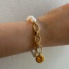 white bracelet White jadeite bracelet with textured pendant