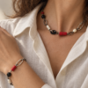 Necklace and bracelet set with pearls, marble, coral and Swarovski crystal